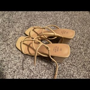 Nude/tan heels. Worn once. Size 9. Block heel.